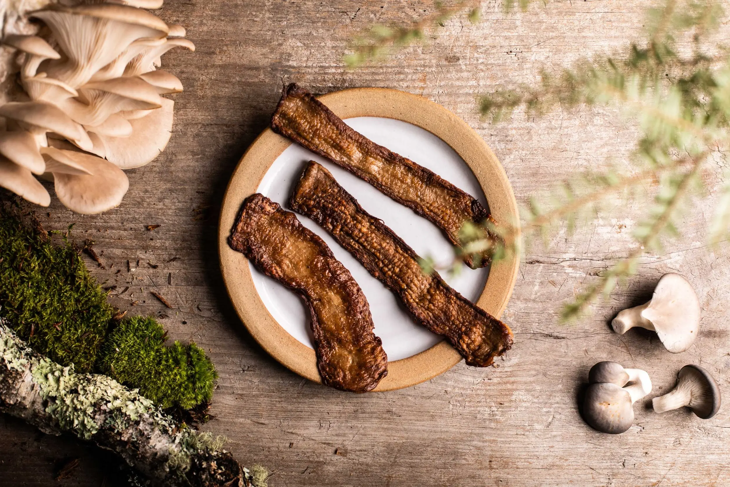 MyBacon strips on a plate with mushrooms and forest elements