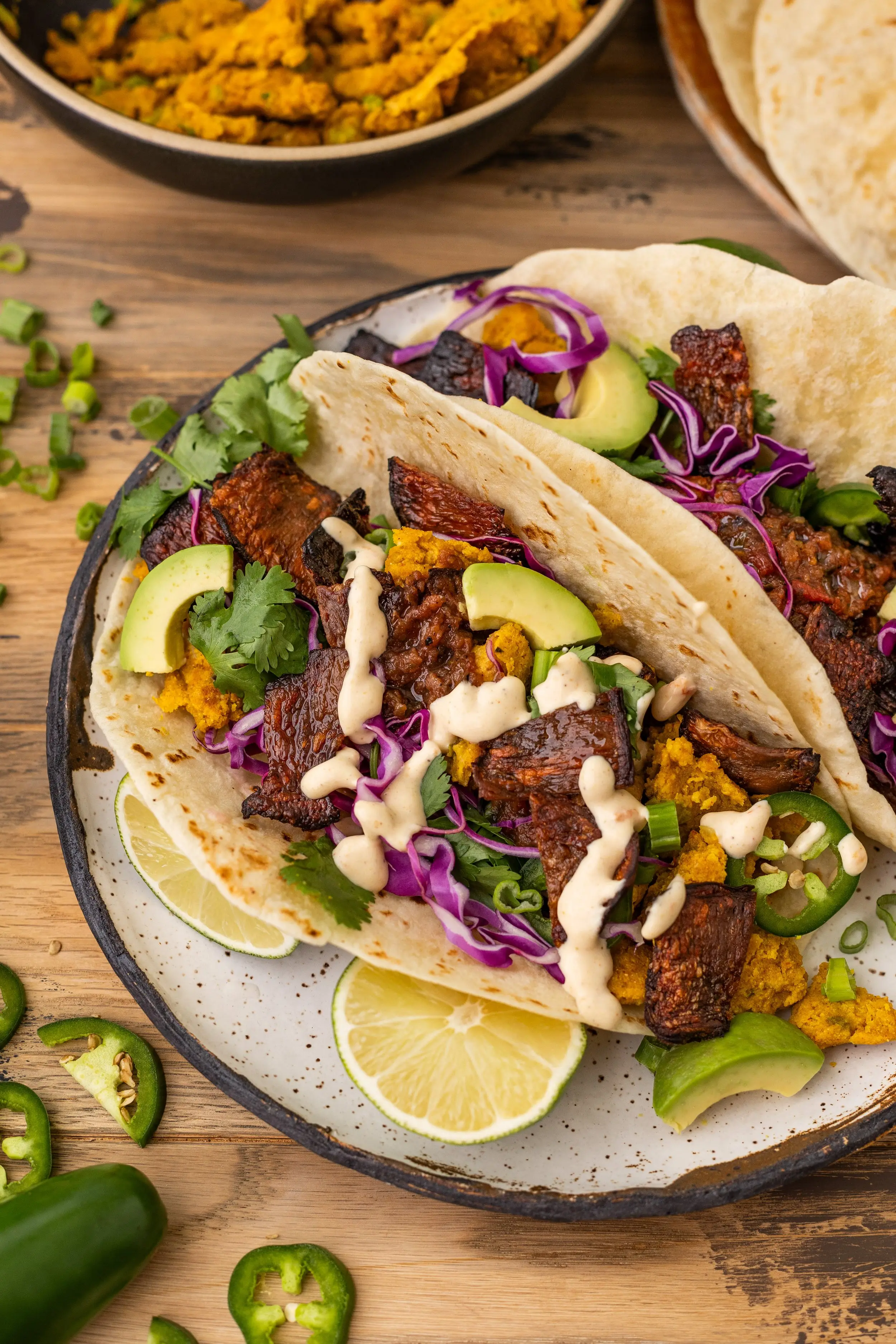 Photo of a finished plate of two MyBacon Chickpea Tacos with Fabalish Queso