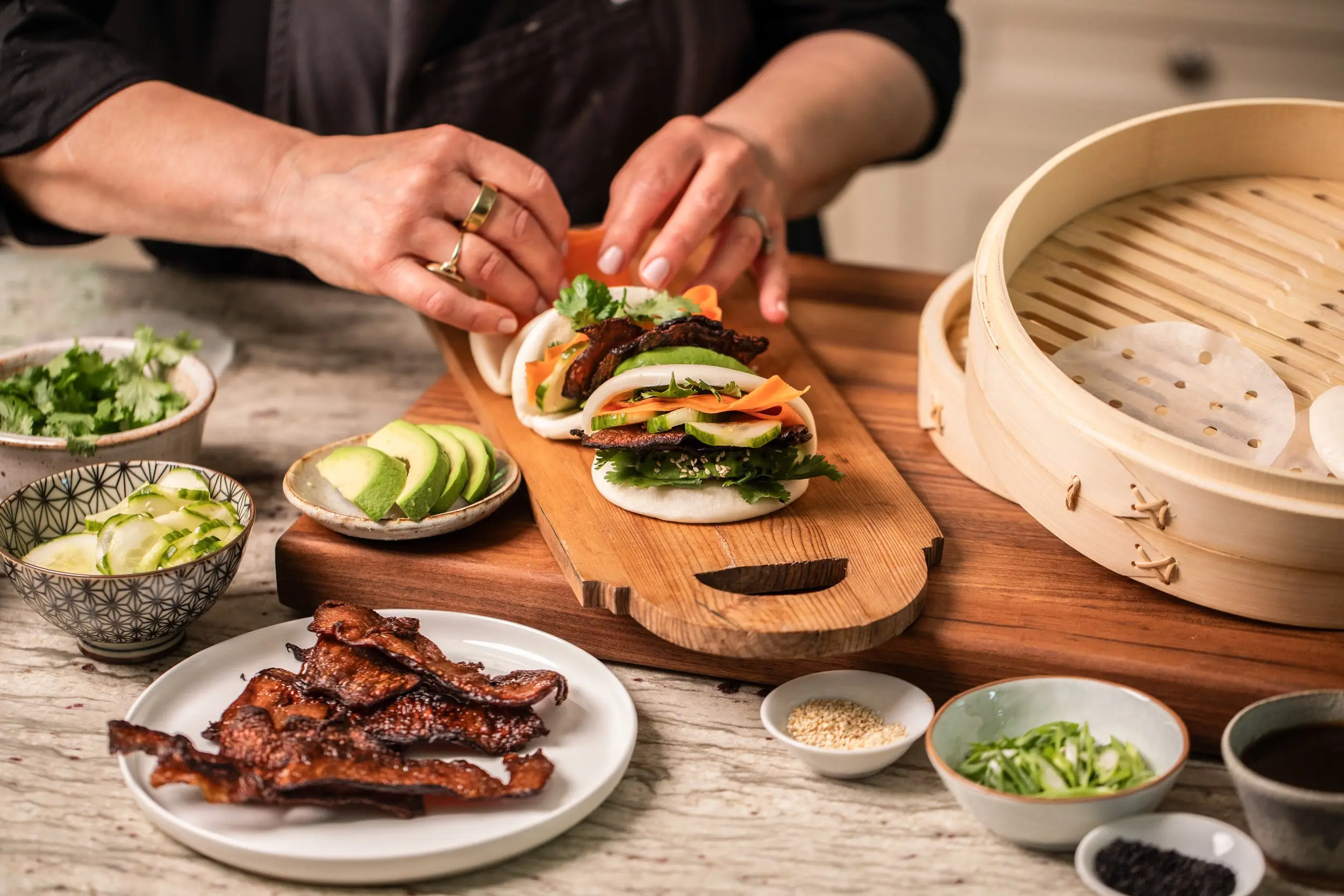 MyBacon Steamed Bao Buns being put together by our chef