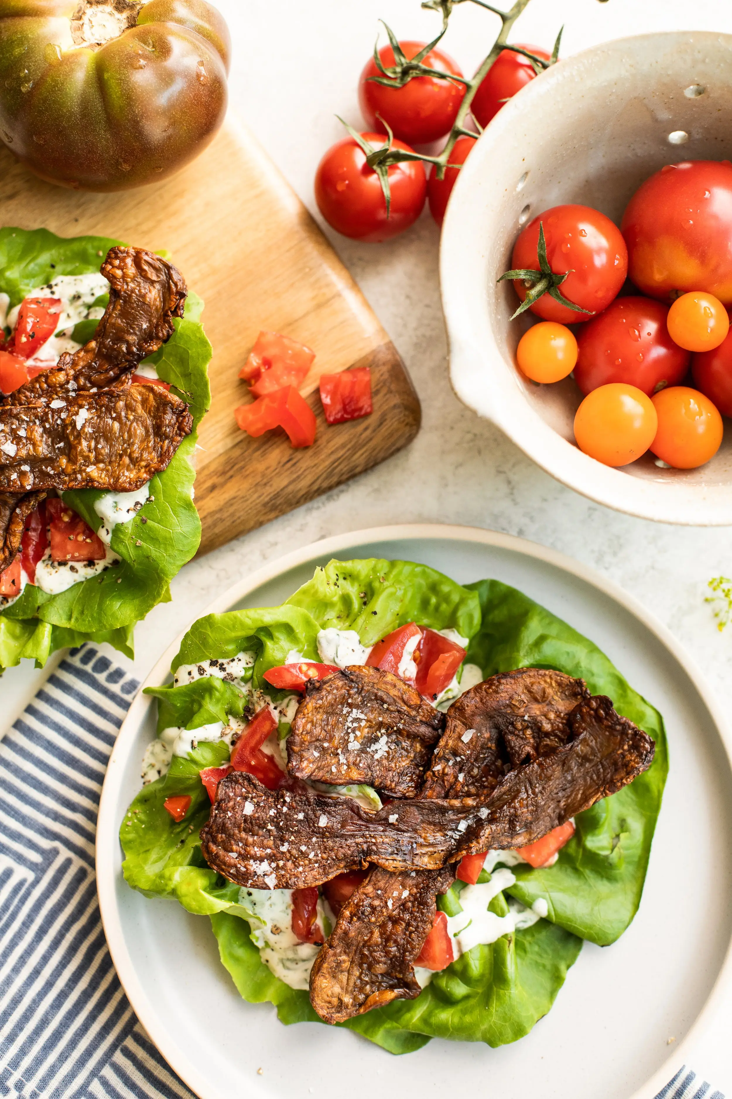 Gluten-free BLT on lettuce leaf